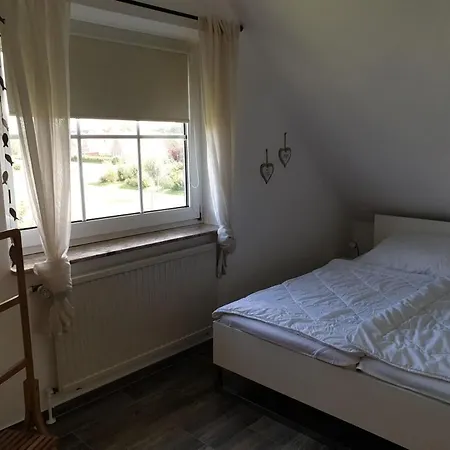 펜션 Ferienhaus Lille Huus Neßmersiel
